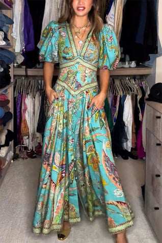 Elizabeth™ | Vestido maxi vaporoso con mangas abullonadas y escote en V
